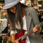 Women Wit Guitar pexels photo