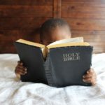 Little Boy Reading Bible