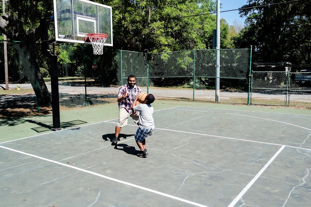 FatheandSonPlayingBasketball